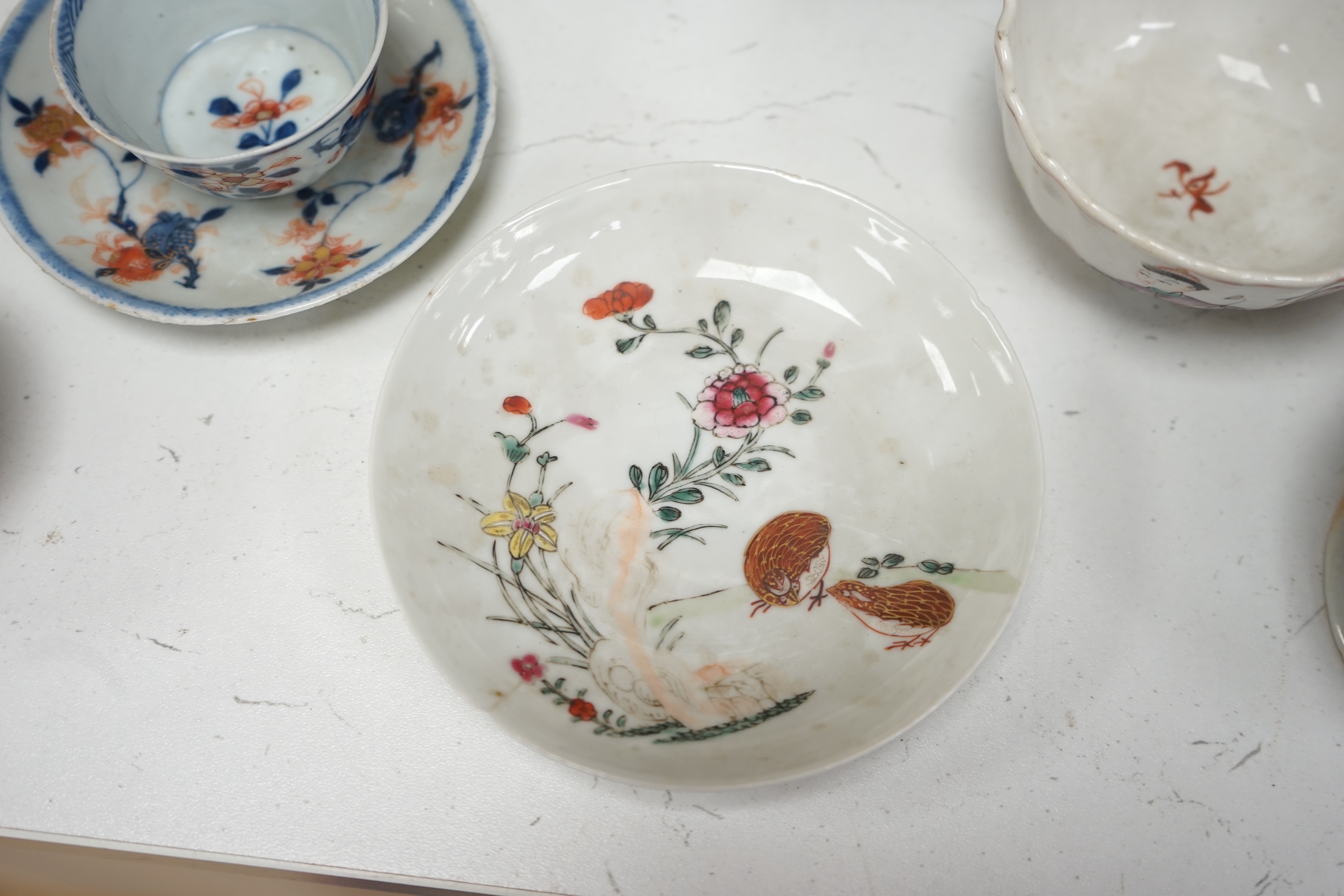 A pair of 18th century Chinese export tobacco leaf pattern pedestal salts, a clobbered Chinese dish (a.f.), now mounted with gilt metal rim, etc., 41cm diameter, together with four 18th century Chinese tea bowls, and thr